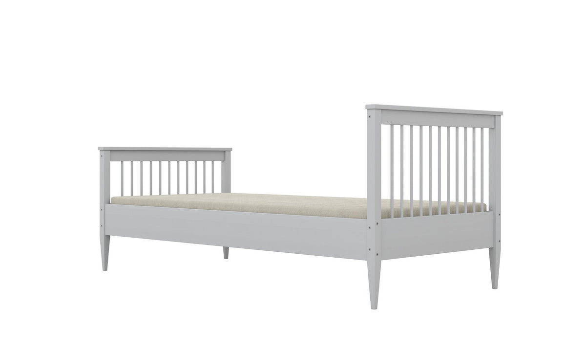 8. White wooden bed with slatted headboard and footboard in studio lighting