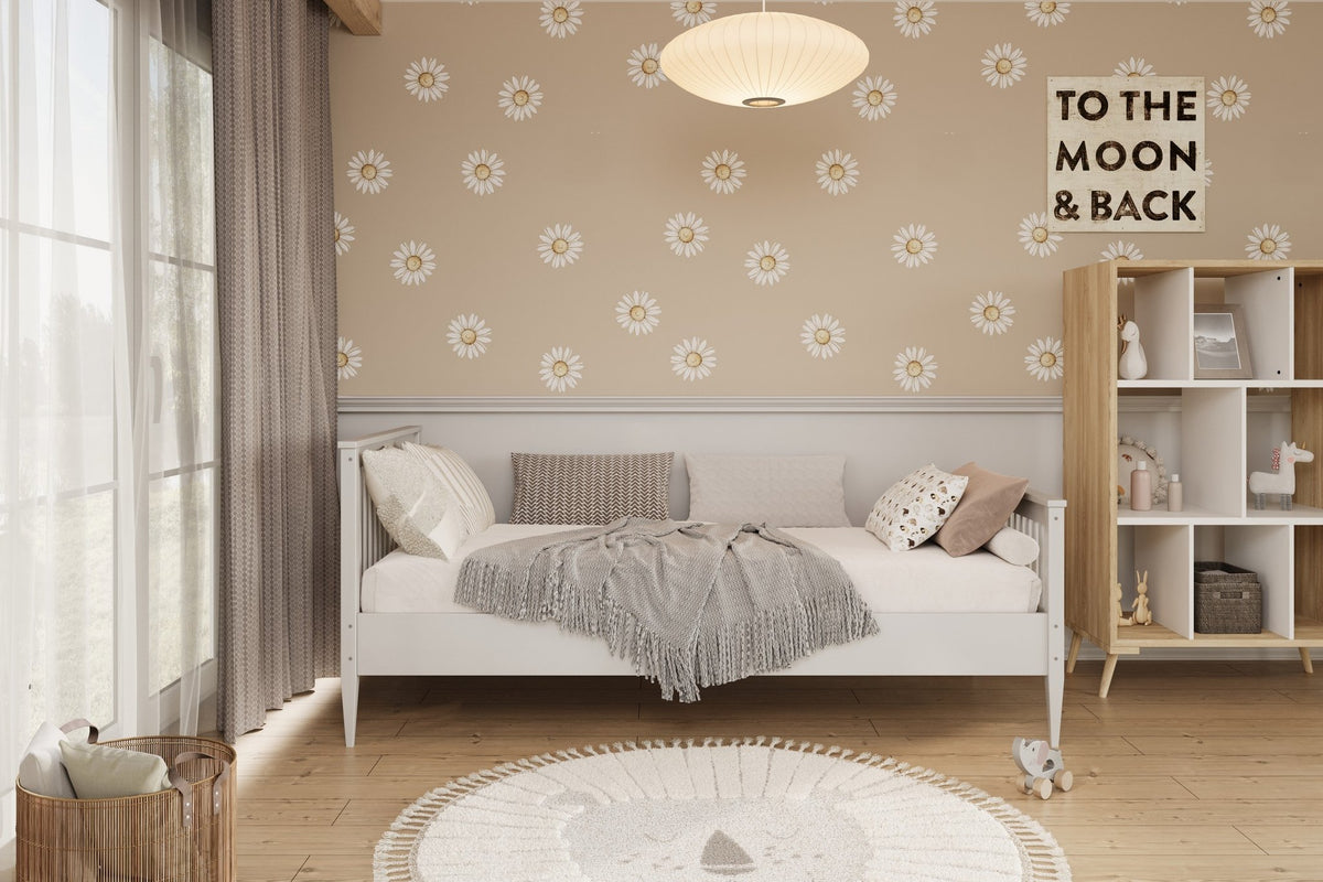 5. White wooden bed in bright bedroom with floral wallpaper and decorative pillows