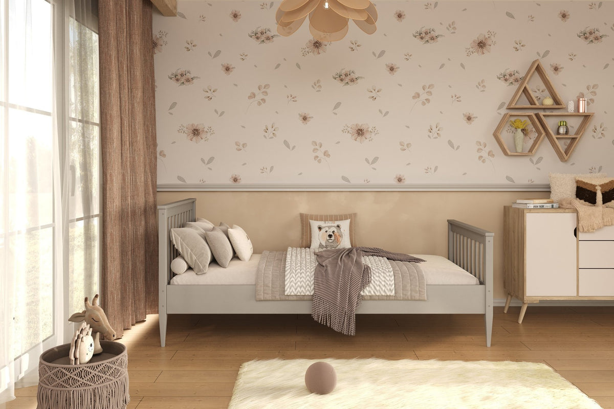 1. Gray wooden bed in a children's room with floral wallpaper and wooden flooring