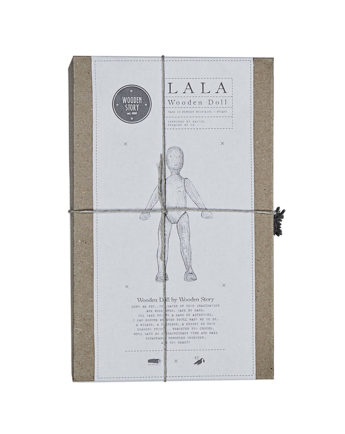 2. Cardboard box with illustration of wooden beech doll and product details