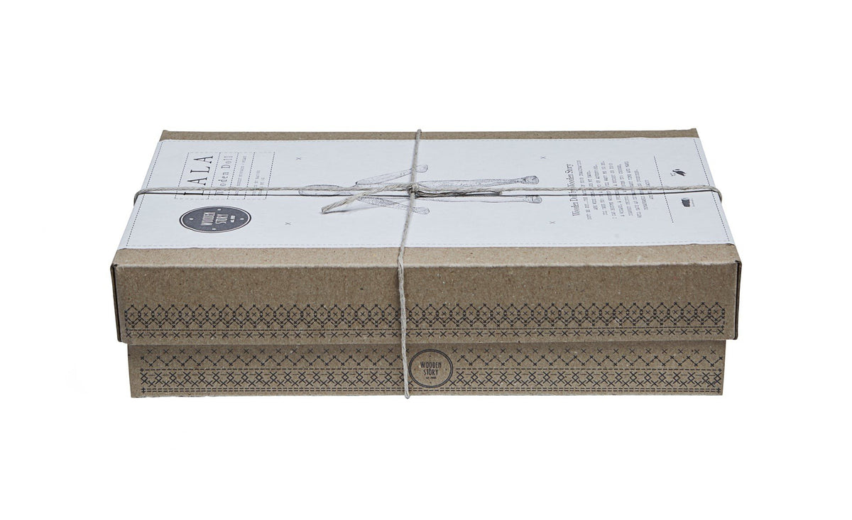 5. Closed cardboard box with Wooden Story branding and string tie