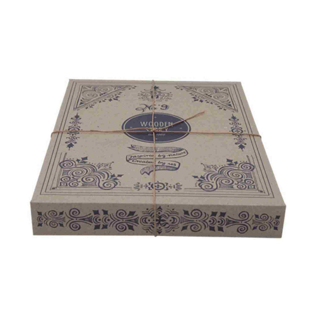 4. Flat lay of Wooden Story cardboard packaging with decorative design, tied with string