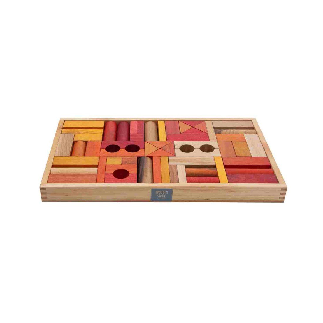 3. Close-up of Wooden Story wooden blocks in a box, featuring warm shades of red, orange, and yellow, promoting imaginative play