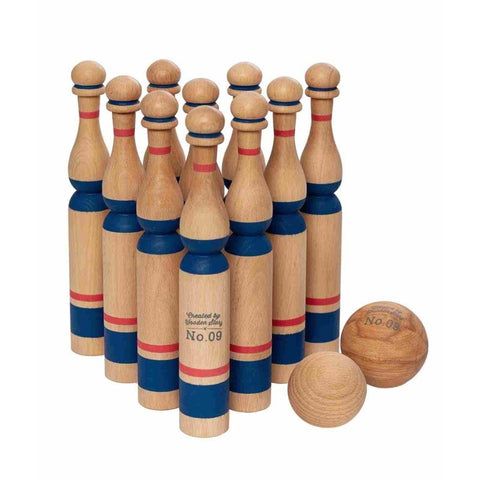 1. Set of ten wooden bowling pins with blue and red stripes and two balls, featuring Wooden Story branding, shown in a studio setting