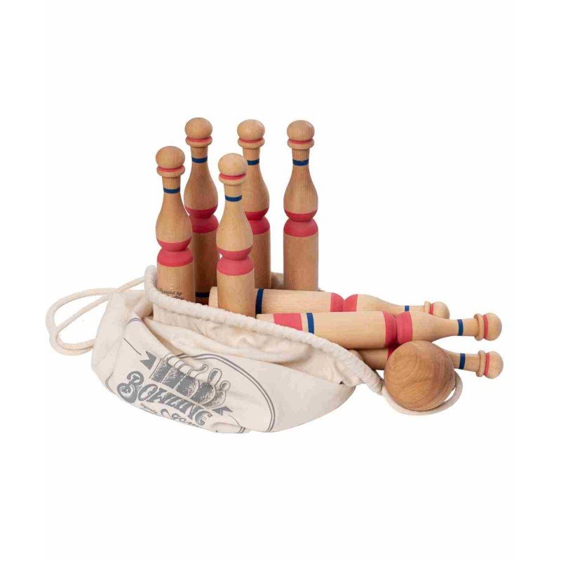 4. Wooden bowling pins and balls partially inside a cotton bag with vintage print