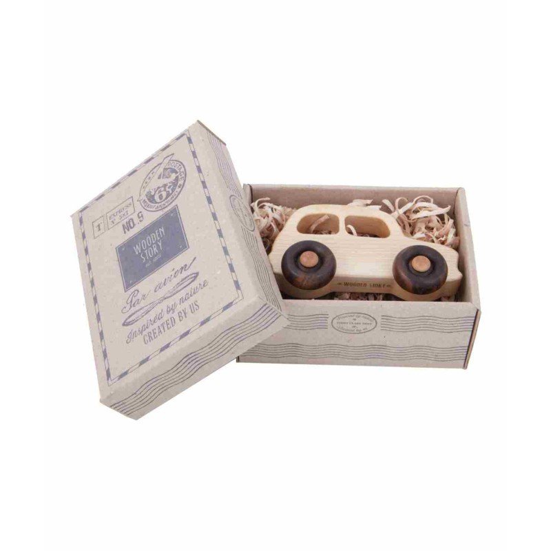 4. Wooden Story toy car in open cardboard box with shredded paper packaging
