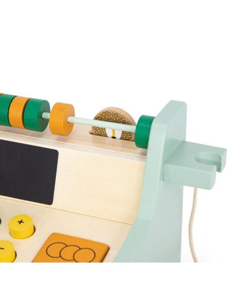 8. Close-up of abacus and coin slot on wooden cash register