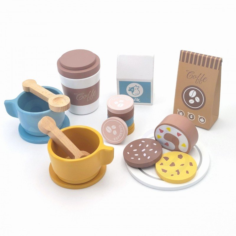 4. Flat lay of Woopie Green barista set accessories including cups, pastries, and coffee bag
