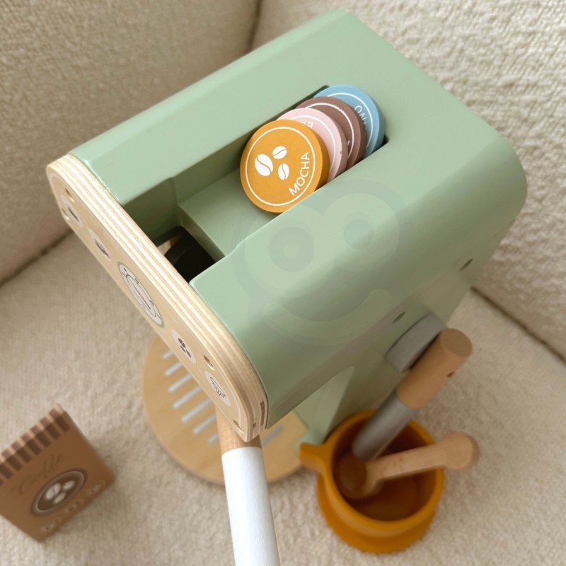 3. Top view of Woopie Green coffee machine with tokens and accessories