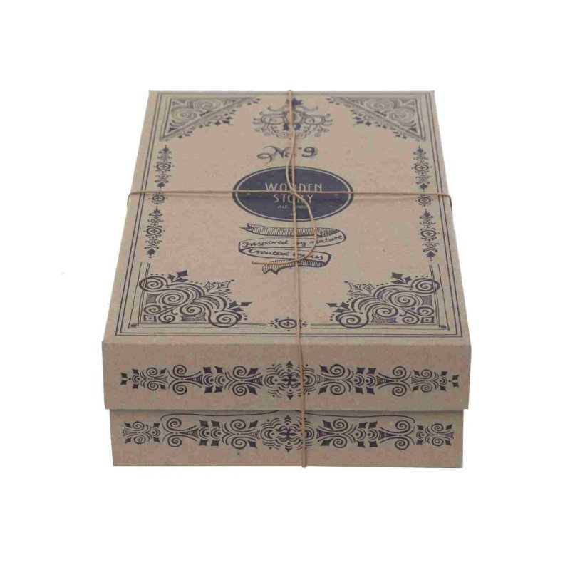 4. Cardboard packaging for Wooden Story puzzle, featuring decorative patterns and tied with string