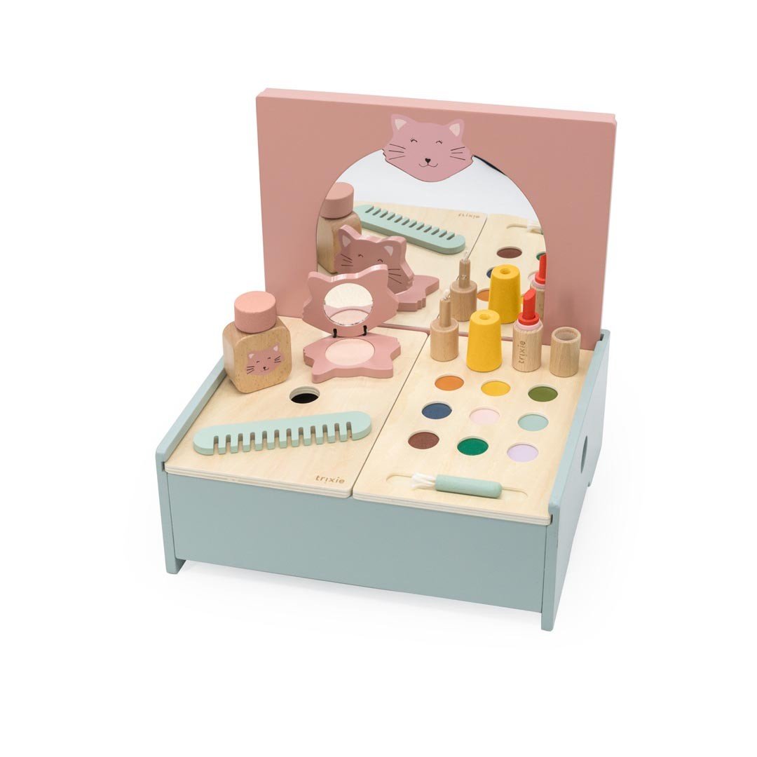 2. Trixie Baby Wooden Make-Up Table with mirror, comb, perfume, lipstick, blush, and nail polish on a white background