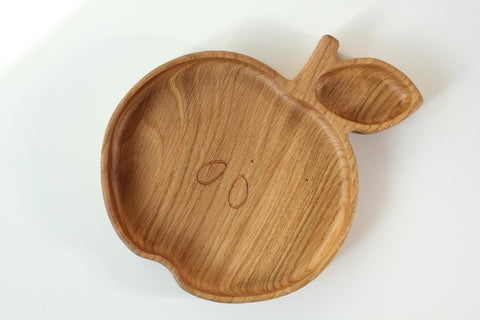 1. Handmade wooden apple-shaped plate for kids made from oak or ash with a smooth finish, shown on a white background