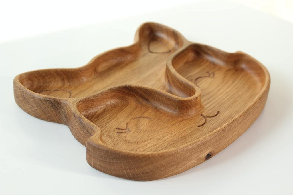 2. Side view of wooden fox-shaped plate with two sectors, showing smooth finish and engraved details on white background