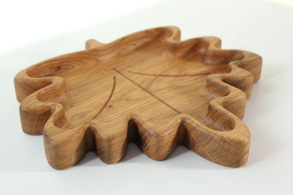 2. Wooden plate for kids in maple leaf design, made from natural oak or ash, displayed on a white surface