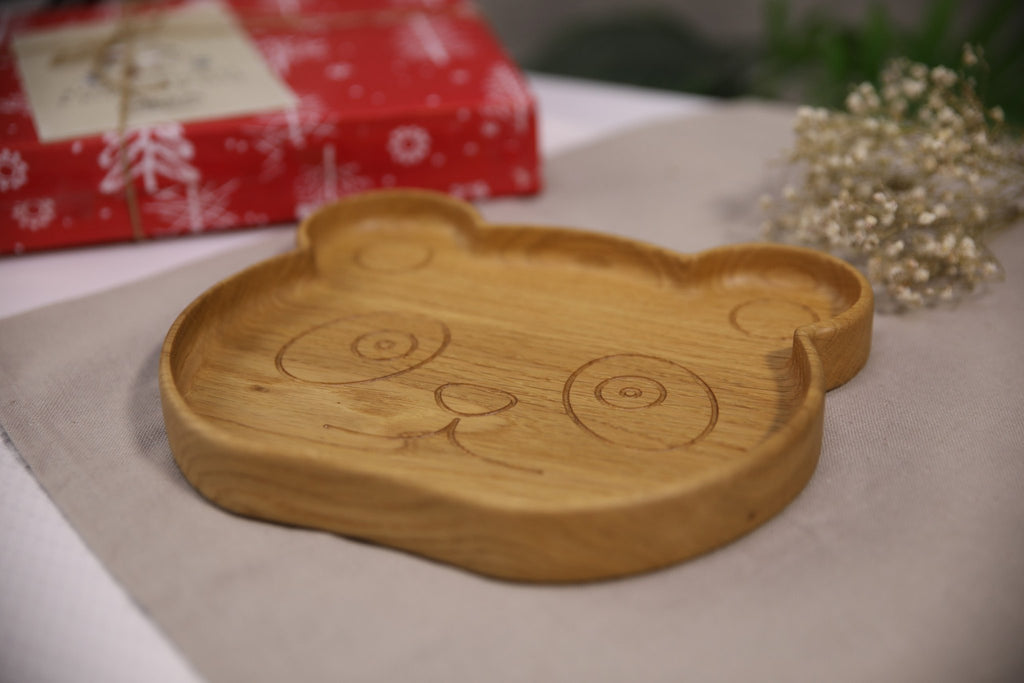 3. Side angle of wooden panda-shaped plate for kids showing depth and smooth finish