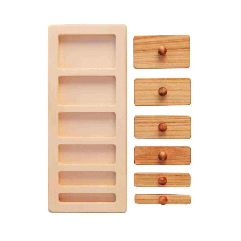 1. Wooden Story puzzle blocks with varying lengths and knobs, shown on a white background