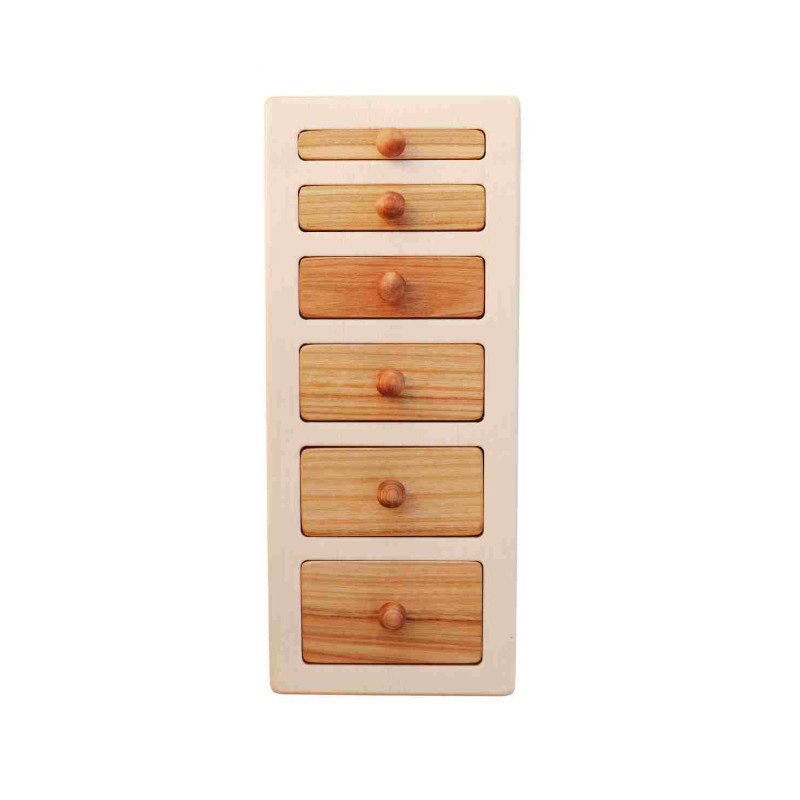 3. Wooden Story puzzle blocks fitted into a base, showcasing different lengths and knobs
