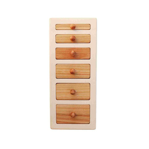 3. Wooden Story puzzle blocks fitted into a base, showcasing different lengths and knobs