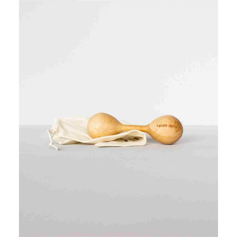 3. Wooden Story Lark wooden rattle with cloth bag on light grey surface