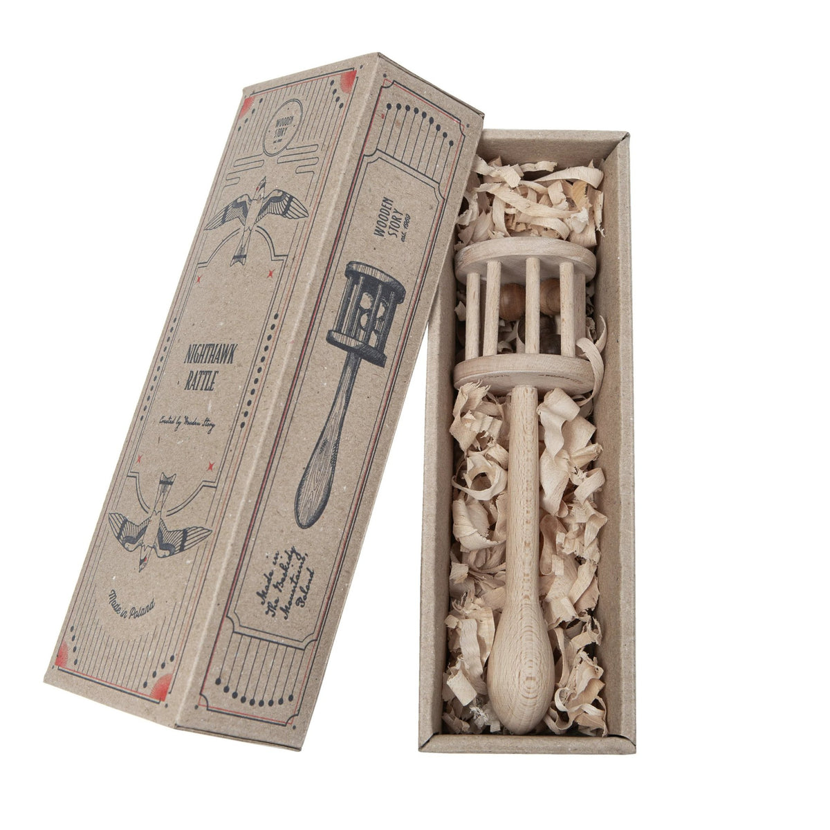 11. Wooden Story rattle in open packaging with shredded paper filling