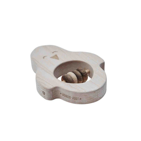 2. Side view of wooden penguin rattle by Wooden Story, showing engraved brand logo and smooth, natural wood texture