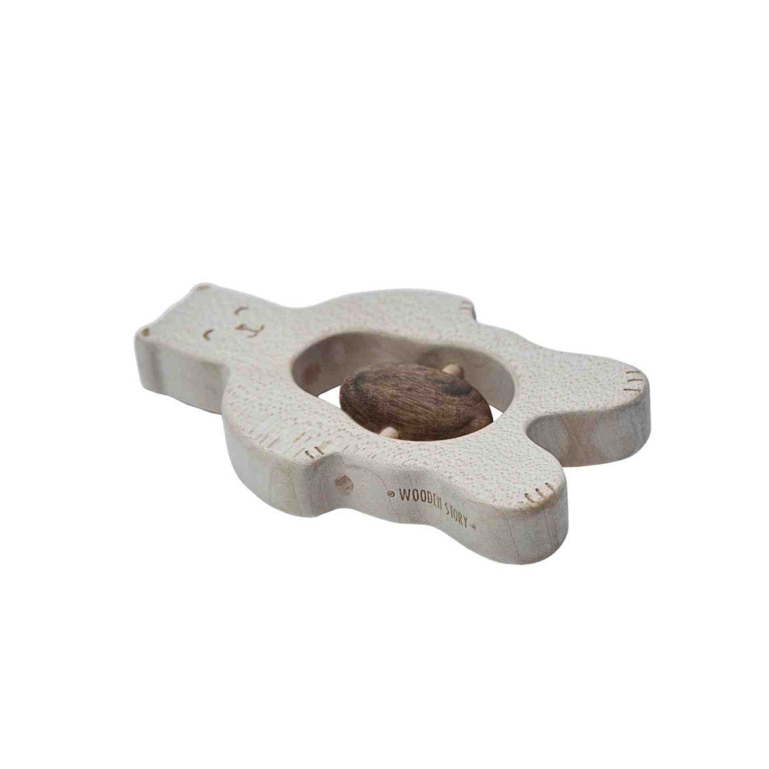 3. Close-up of wooden teddy bear rattle lying flat, highlighting natural wood texture and Wooden Story branding