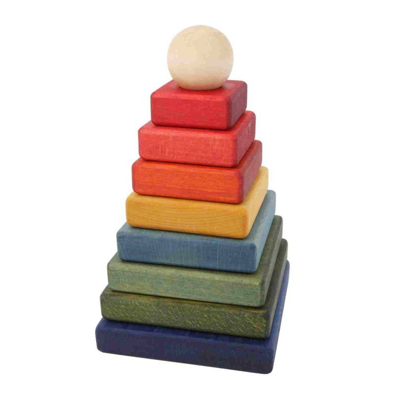 2. Colorful wooden square pyramid toy with natural ball on top, featuring red, orange, yellow, blue, and green blocks, shown in studio setting