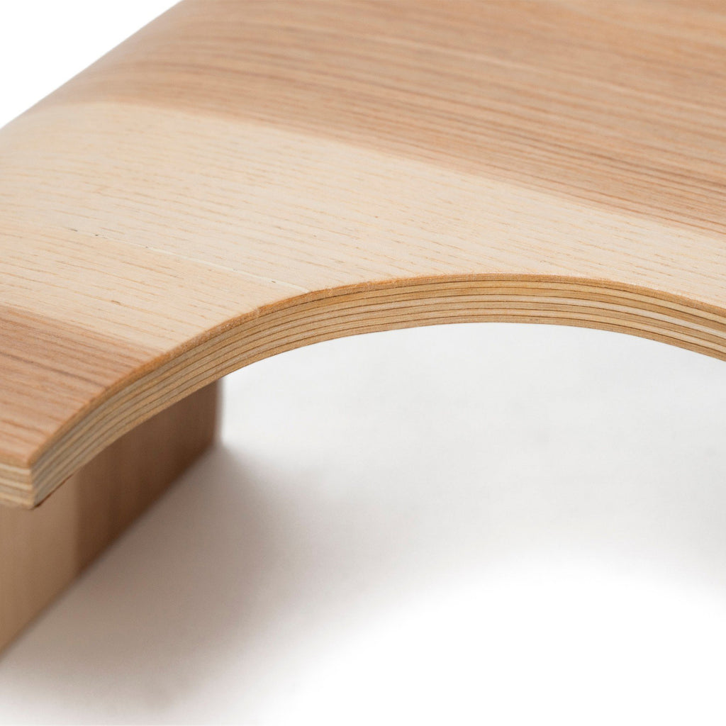 3. Close-up of birch plywood step stool highlighting smooth rounded edge and layered wood texture