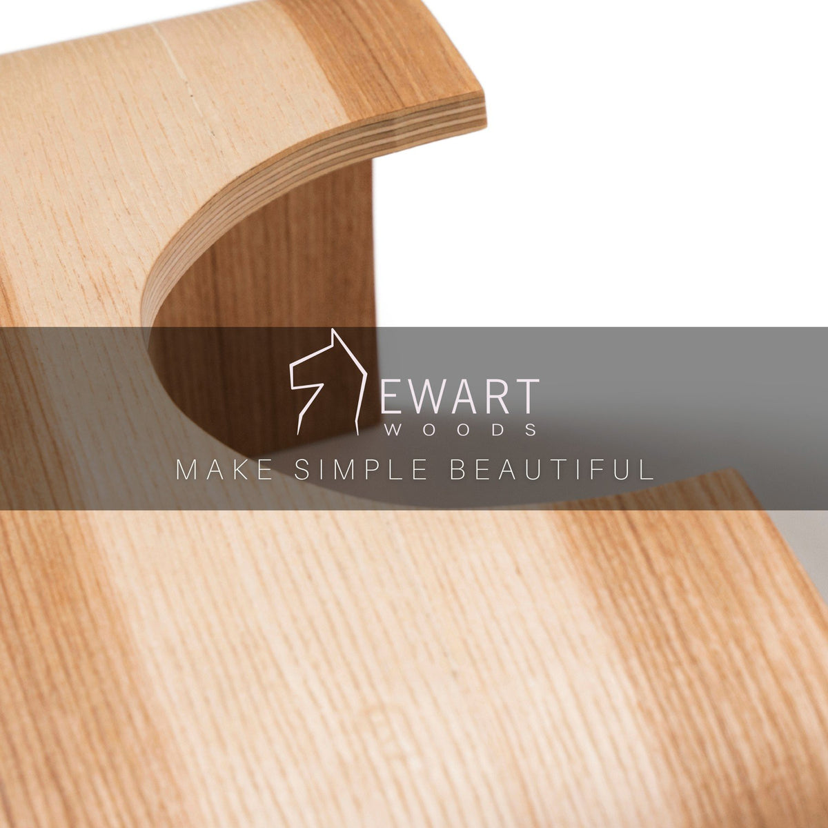 2. Detail of Ewart Woods logo on wooden step stool with text 'Make Simple Beautiful'