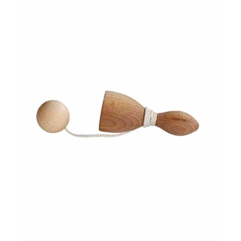4. Flat lay of Wooden Swing and Catch game showing wooden ball and handle with string