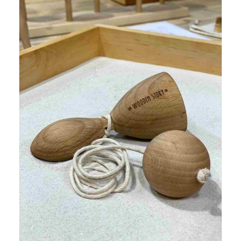 3. Close-up of Wooden Swing and Catch game showing Wooden Story logo on wooden surface