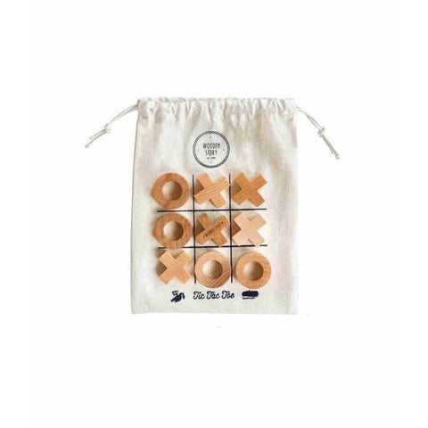 2. Cotton bag with Wooden Story logo and tic-tac-toe grid, filled with wooden X and O pieces