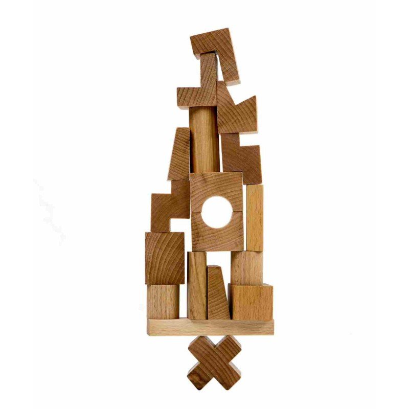2. Wooden Story natural wooden tower puzzle blocks stacked in a creative formation on a white background
