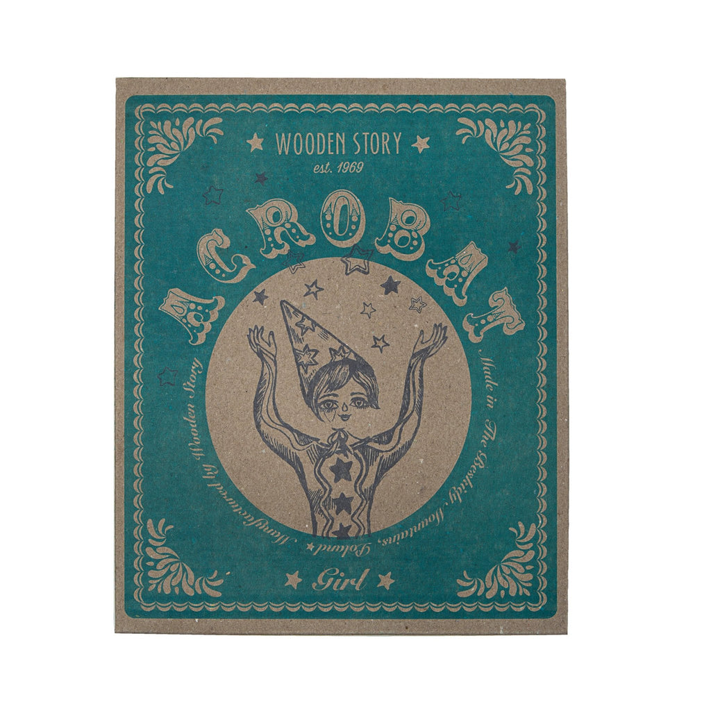 4. Close-up of Wooden Story acrobat toy packaging with vintage design and brand logo