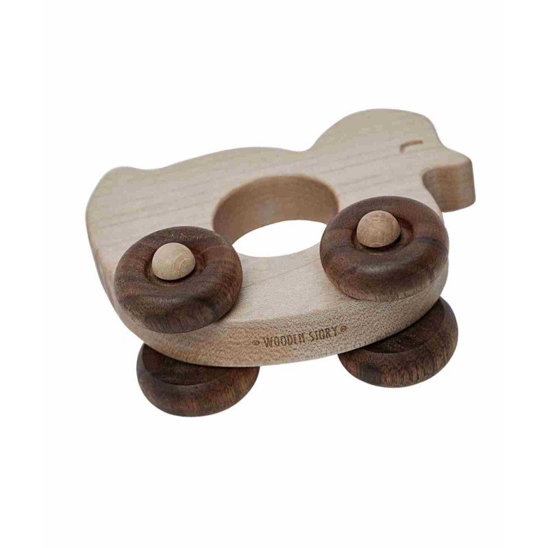 3. Close-up of Wooden Story duck toy on wheels showing brand engraving and smooth finish