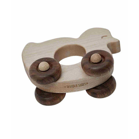 3. Close-up of Wooden Story duck toy on wheels showing brand engraving and smooth finish