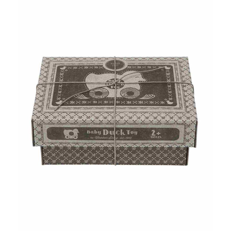 4. Cardboard packaging for Wooden Story duck toy with vintage design and string tie