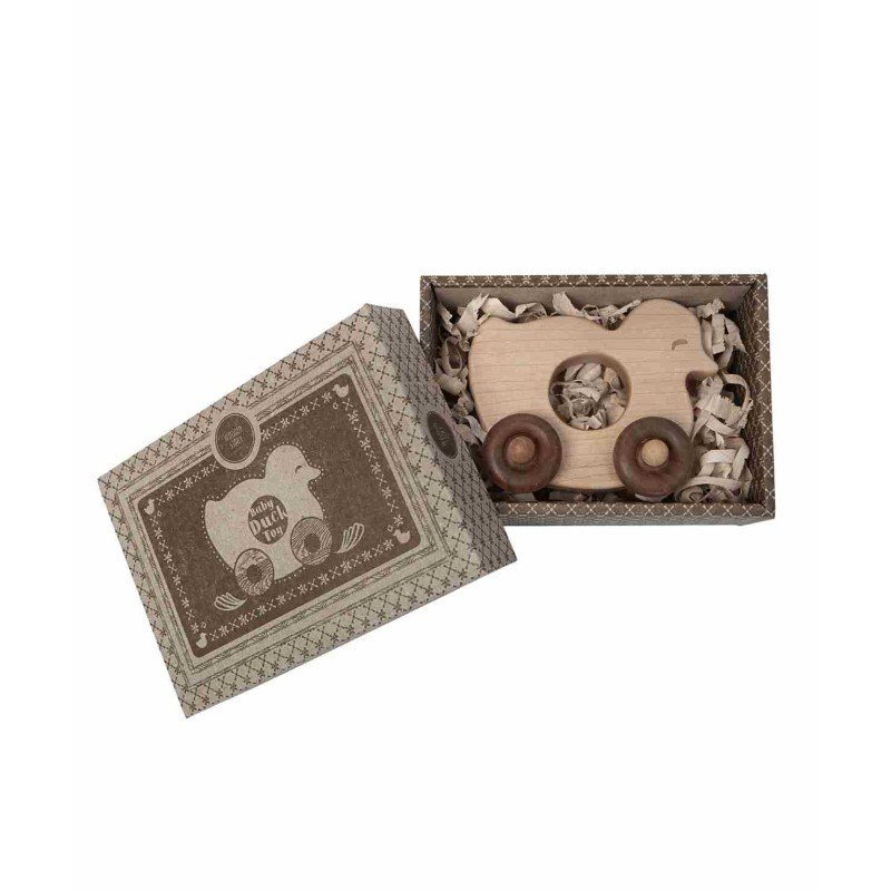 4. Open box showing Wooden Story duck toy nestled in eco-friendly packaging