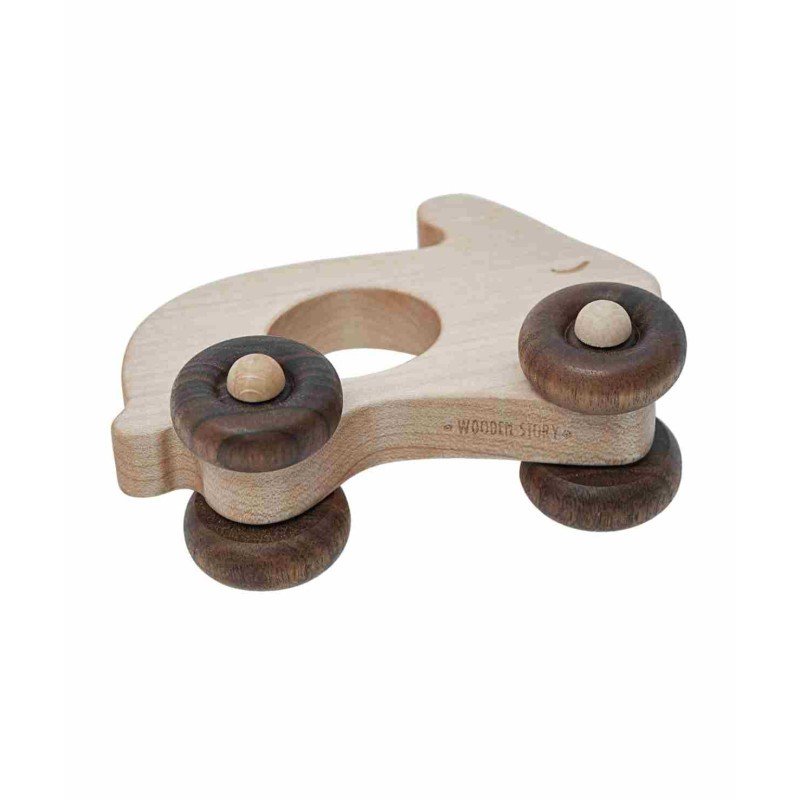 3. Close-up of wooden rabbit toy on wheels, highlighting smooth texture and natural wood grain
