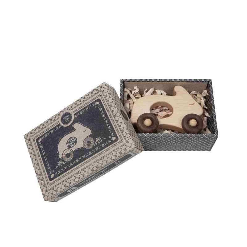 4. Wooden rabbit toy on wheels in open packaging box with decorative design