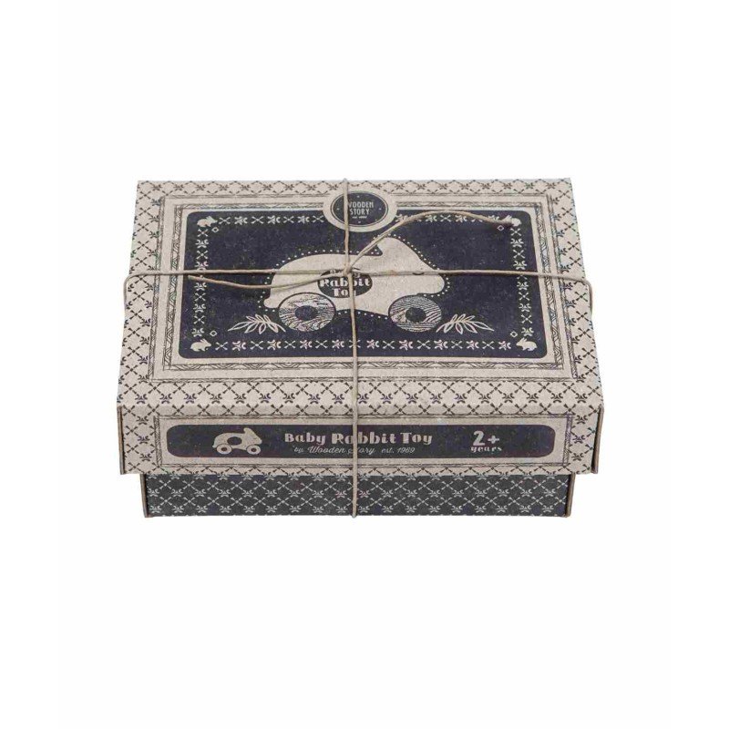 5. Closed packaging box for wooden rabbit toy, featuring vintage-style design and branding