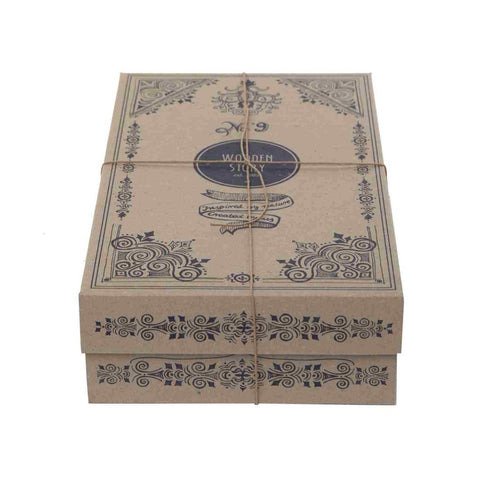 4. Decorative Wooden Story packaging box with intricate designs and branding, tied with string