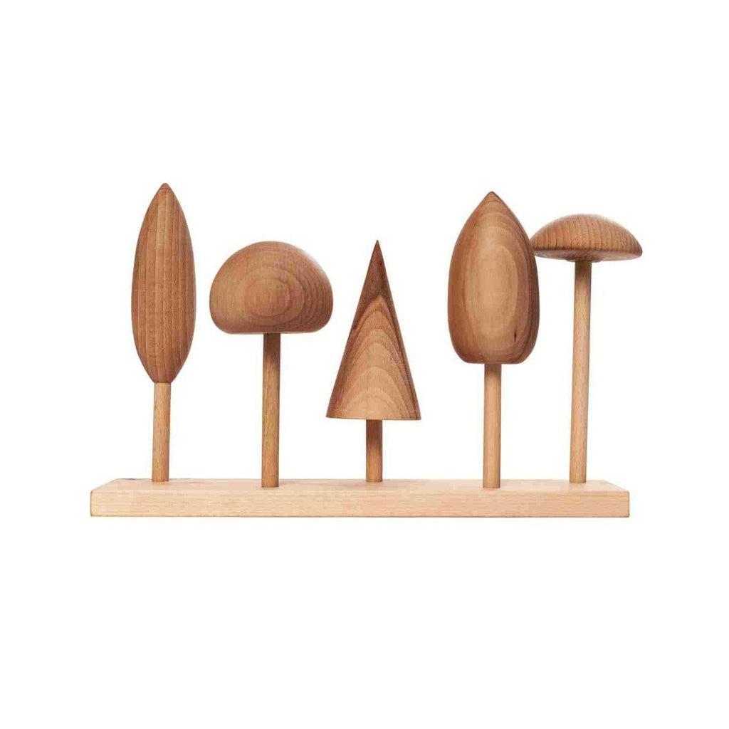 1. Wooden Story tree crown puzzle with five wooden tree shapes on a base, showcasing various crown designs against a white background