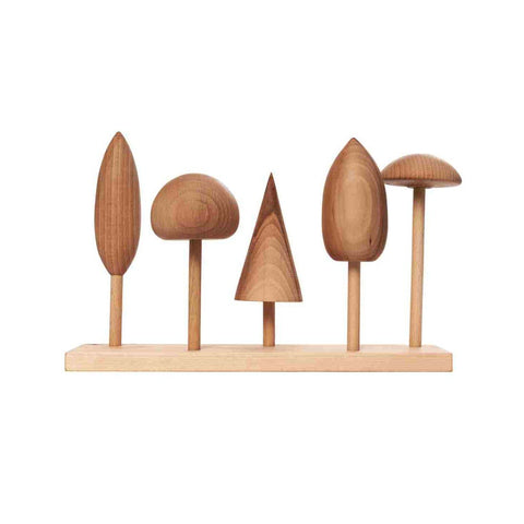 1. Wooden Story tree crown puzzle with five wooden tree shapes on a base, showcasing various crown designs against a white background