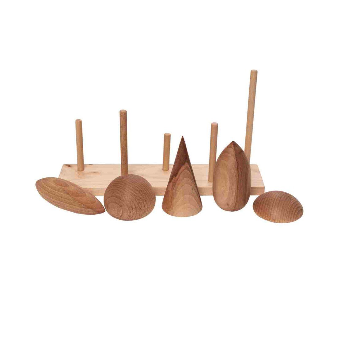 3. Close-up of Wooden Story tree crown puzzle pieces disassembled, showing different wooden tree shapes and base