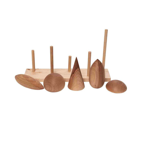 3. Close-up of Wooden Story tree crown puzzle pieces disassembled, showing different wooden tree shapes and base