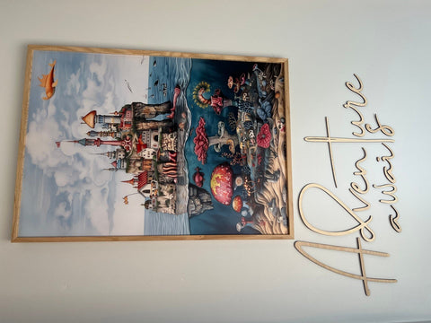 5. Close-up of 'Adventure Awaits' wooden wall sign next to fantasy castle artwork in child's room
