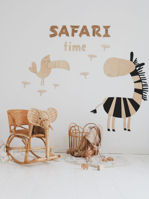 2. Children's room with 'Safari Time' wooden wall sign, wicker chair, and animal decorations