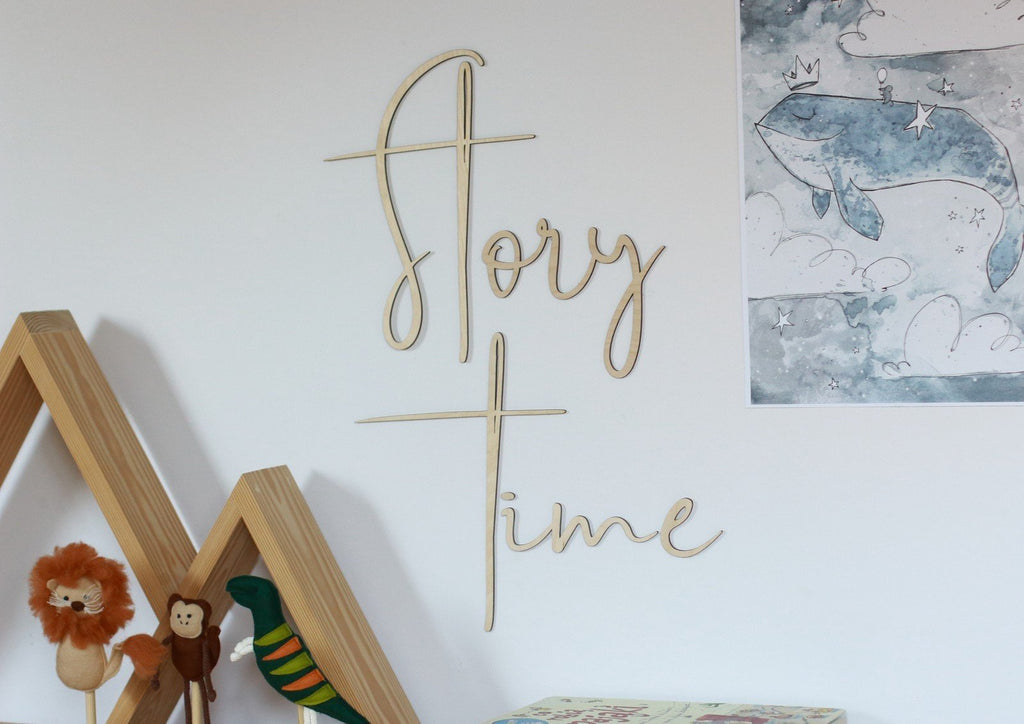 1. Wooden wall sign with 'Story Time' inscription in a child's room, featuring playful decor and a whimsical whale illustration on the wall.