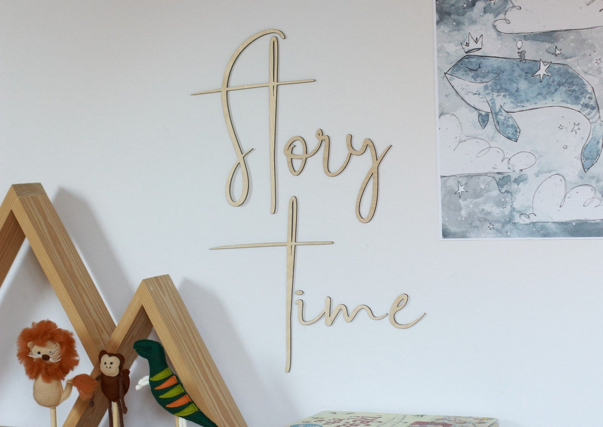1. Wooden wall sign with 'Story Time' inscription in a child's room, featuring playful decor and a whimsical whale illustration on the wall.